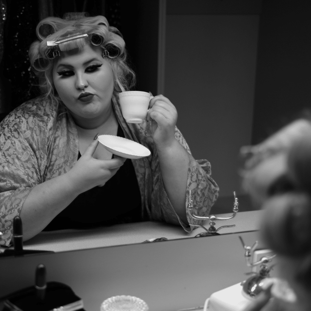 Charlee with hair in rollers and coffee cup 1